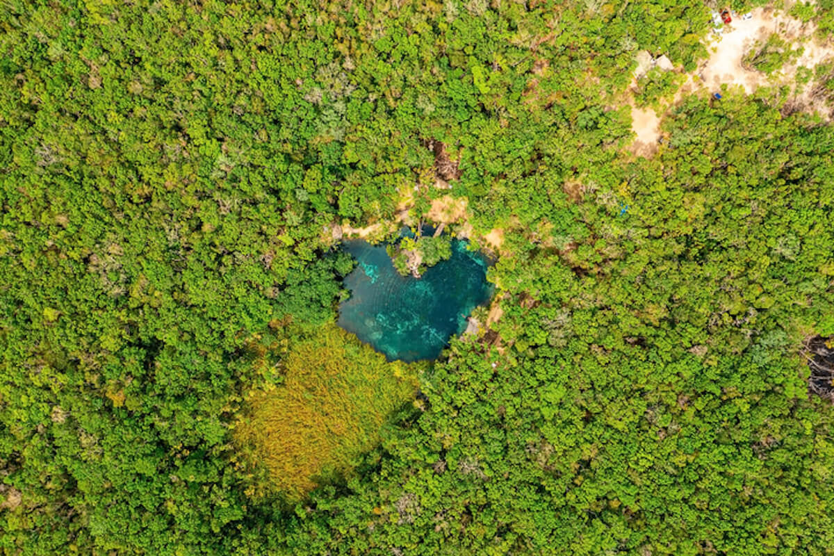Drone shot of Cenote Corazon in Tulum