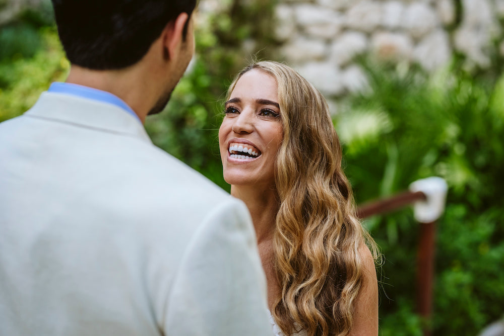 Bride looking at her husband to be at Xcaret Hotel