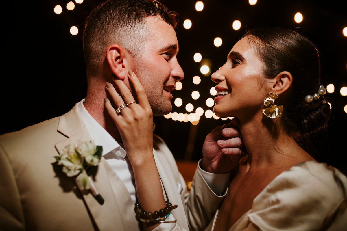 bride and groom embrace