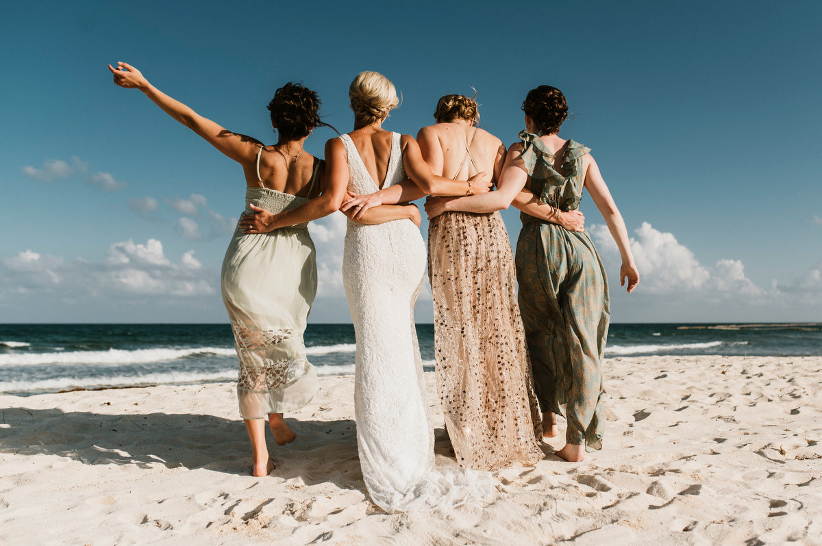 Bride and her bridesmaids back on the beach at Valentin Imperial Maya