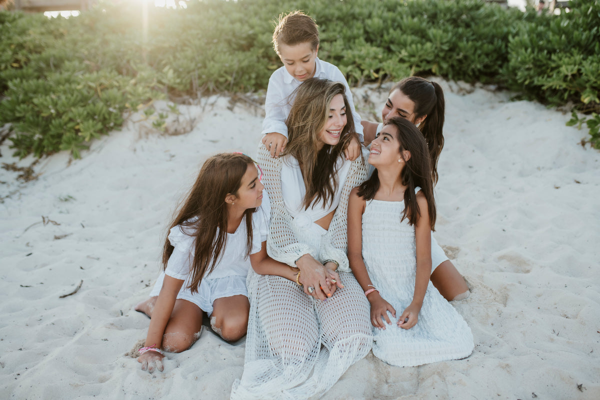 Mother and kids at the beach in Vidanta Riviera Maya