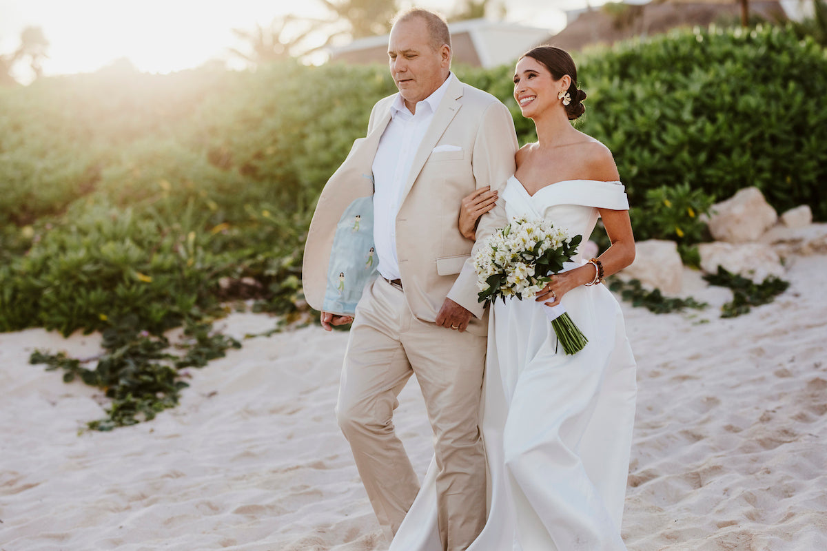 bride and father walking down the aisle