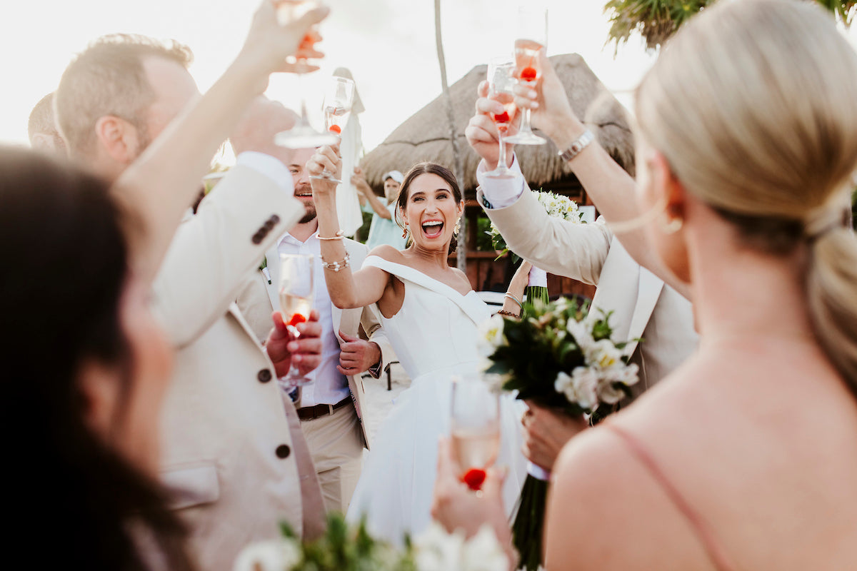 bride celebrates with her party