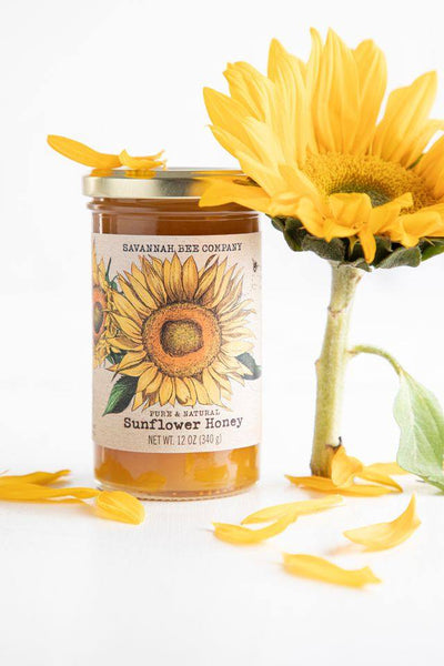 Sunflower honey 12 ounce jar with a sunflower