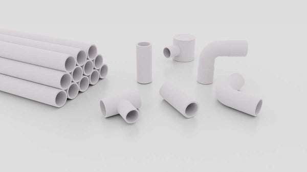 stack of white pvc pipe and fittings