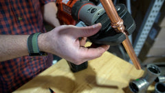 close up of copper pipe inside of ProPress Jaws and RIDGID Press Tool