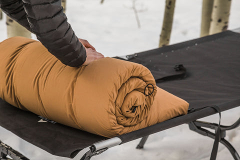 A TETON Sports Vista One-Person Tent Bundle set-up in the snow.