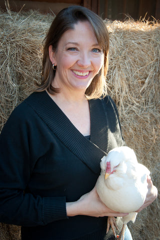 Senora Gose with her chickens