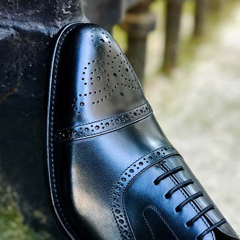 Chaussures de ville pour homme à bout fleuri