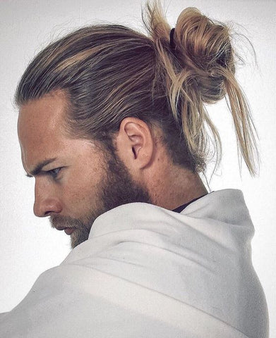 Brad Pitt Haircut: Stylish Casual Ponytail for Men - Hairstyles Weekly