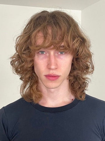The Shaggy Layers Hairstyles for Curly Long Hair Men