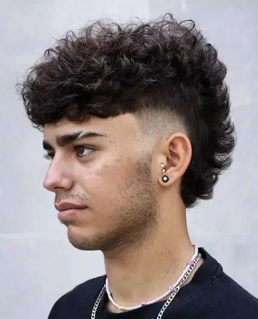 Curly Mohawk with Tapered Sides Haircut for Men