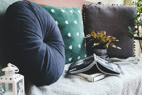 3 different cushions on a couch