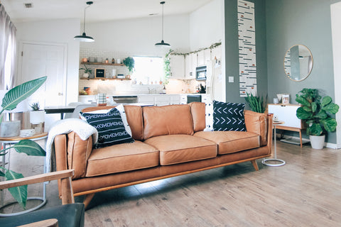 pillows on a leather couch