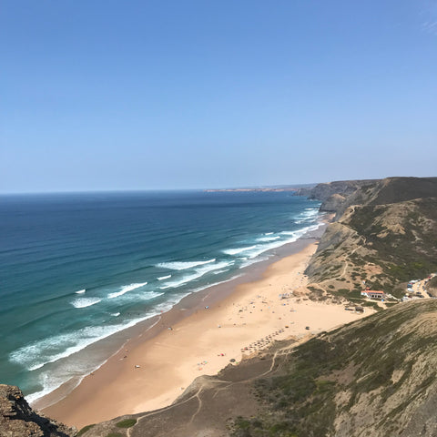 Praia do Cordoama - beach with sand in Portugal surrounded by cliffs