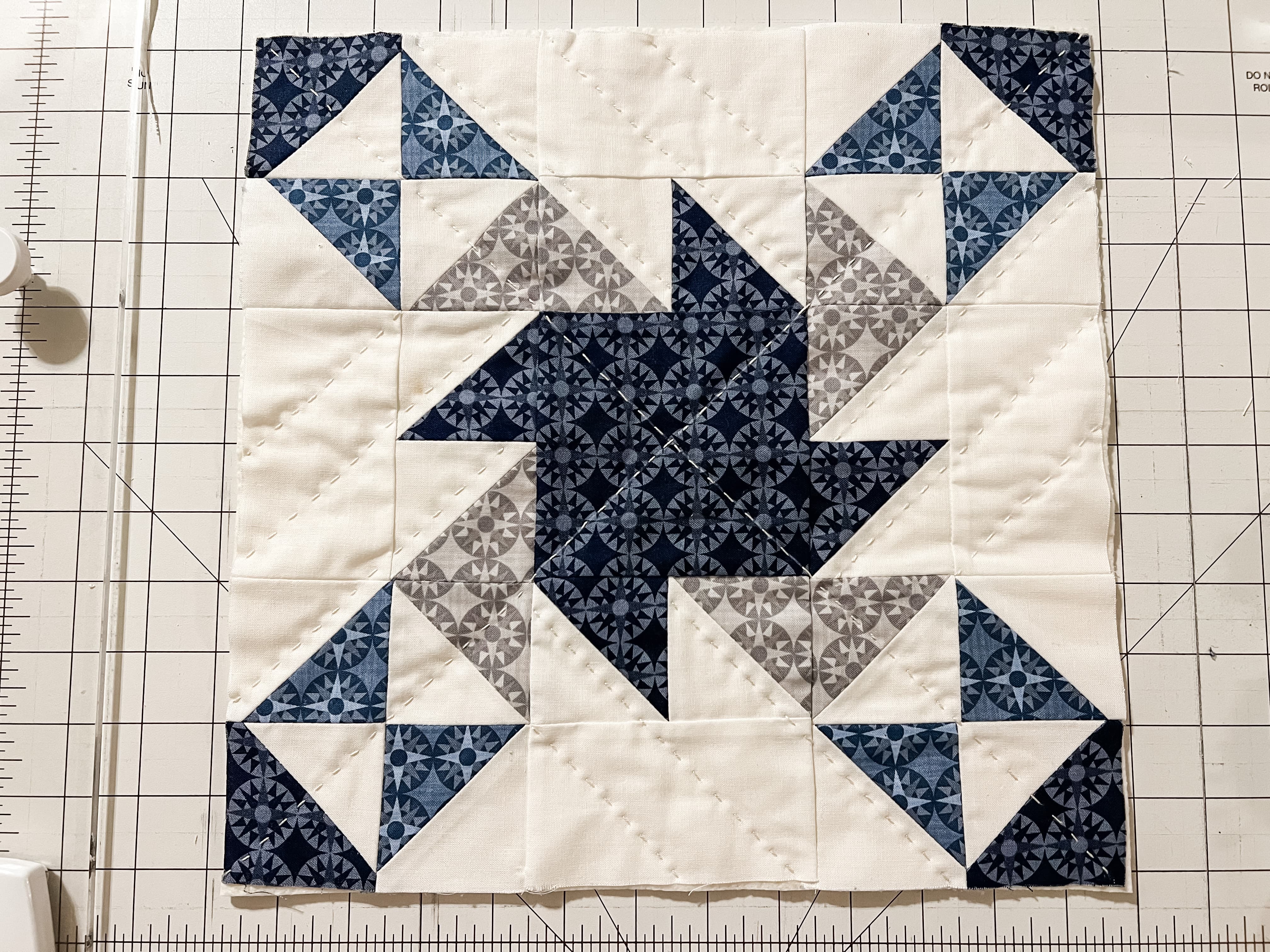 Quilt block that has been quilted and trimmed