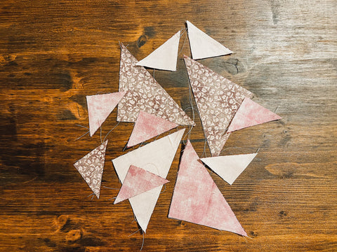 Extra half-square triangles from making the Hearts Together quilt block