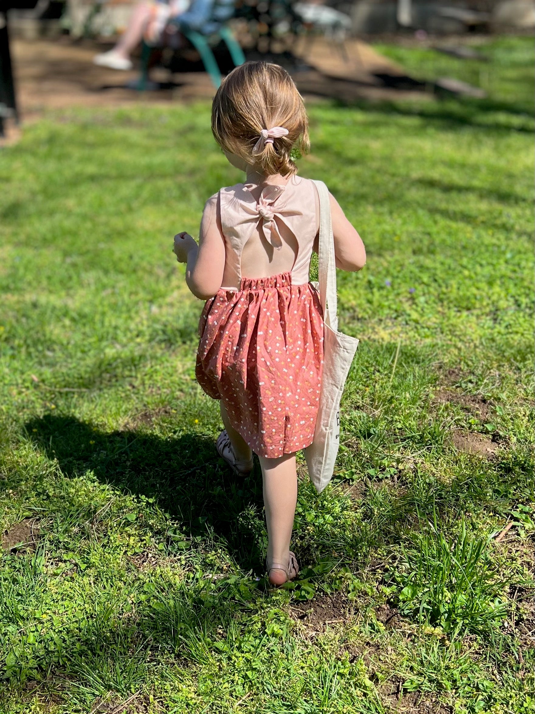 Pippa wearing her Daisy dress made using the Oh Me Oh My Sewing pattern