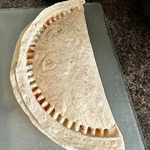 A tortilla that has been sealed by the CRIMPiT Tortilla Sealer