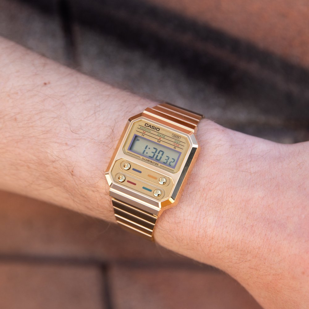 Unique wathces. Casio vintage watch on wrist with all-gold case and strap.