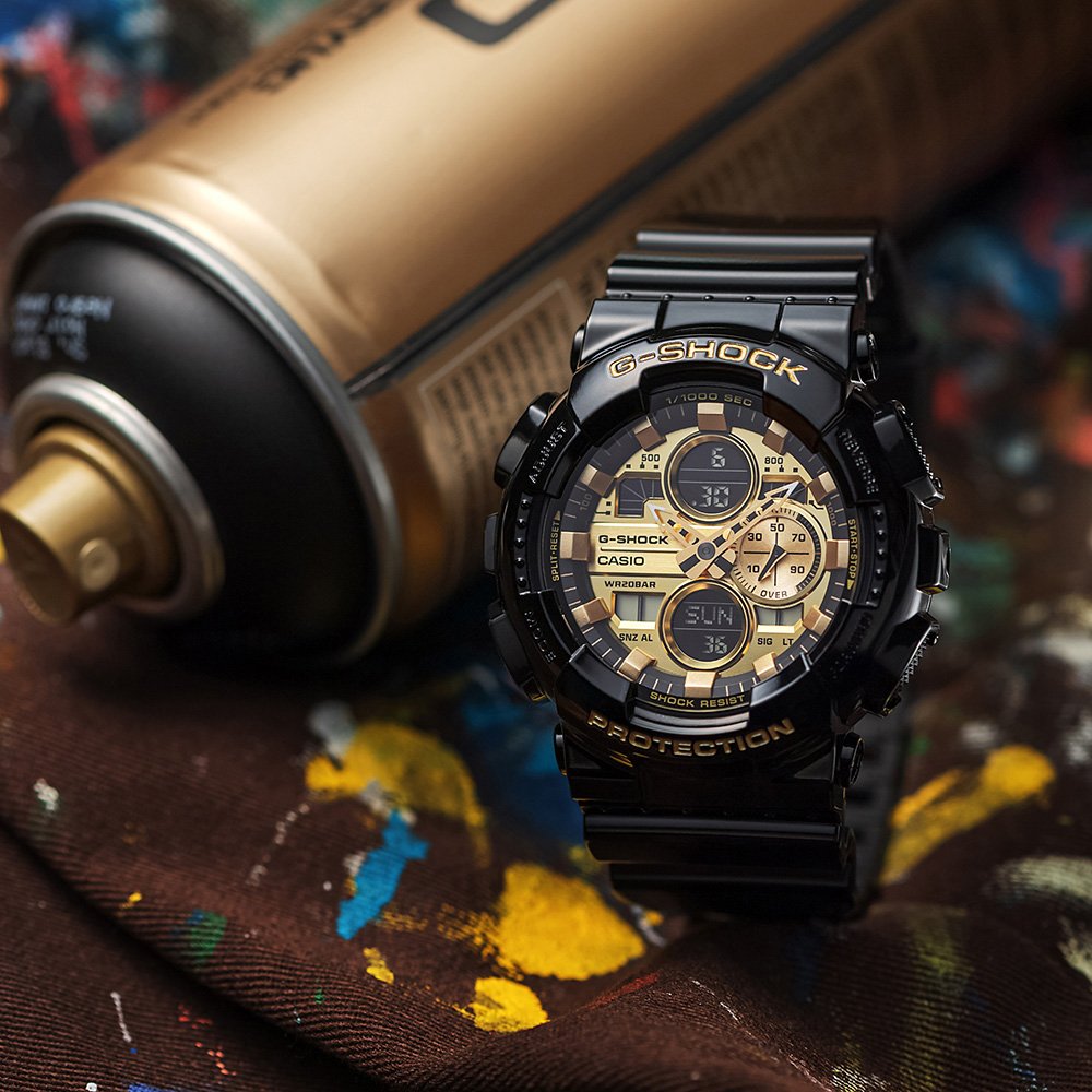 10 Best Dive Watches - Complete Guide For 2022. G-Shock with golden dial and dark digital screen.