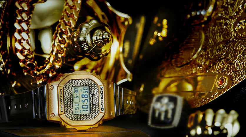 G-Shock Gold Chain DWE-5600HG-1. Casio square gold case with black interchangeable strap
