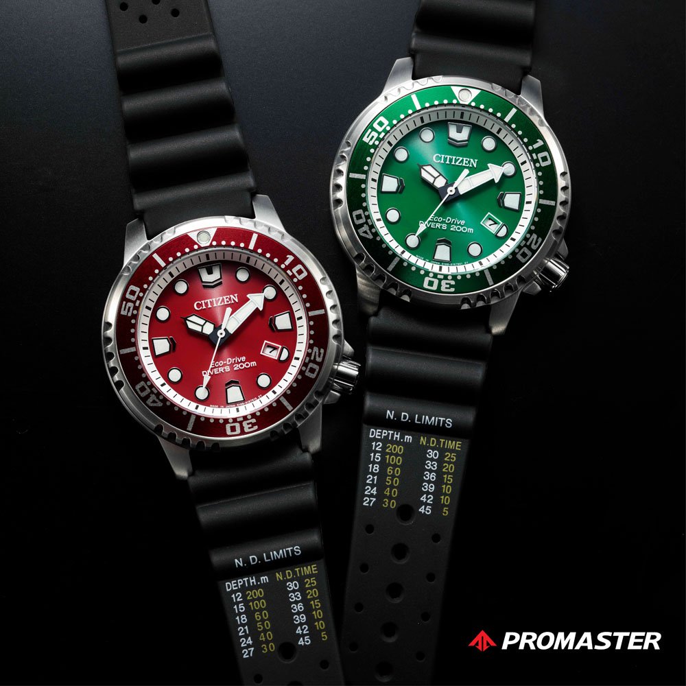 10 Best Dive Watches - Complete Guide For 2022. Green and red citizen divers watches with no-decompression limit tables on strap.