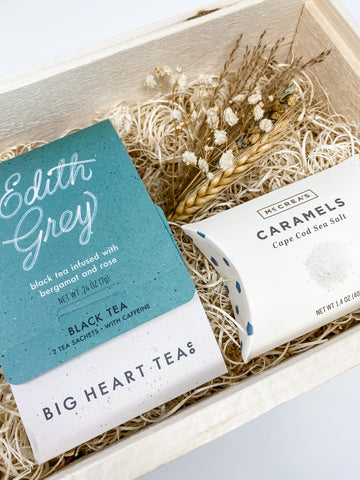 Luxury gift box with tea and caramels