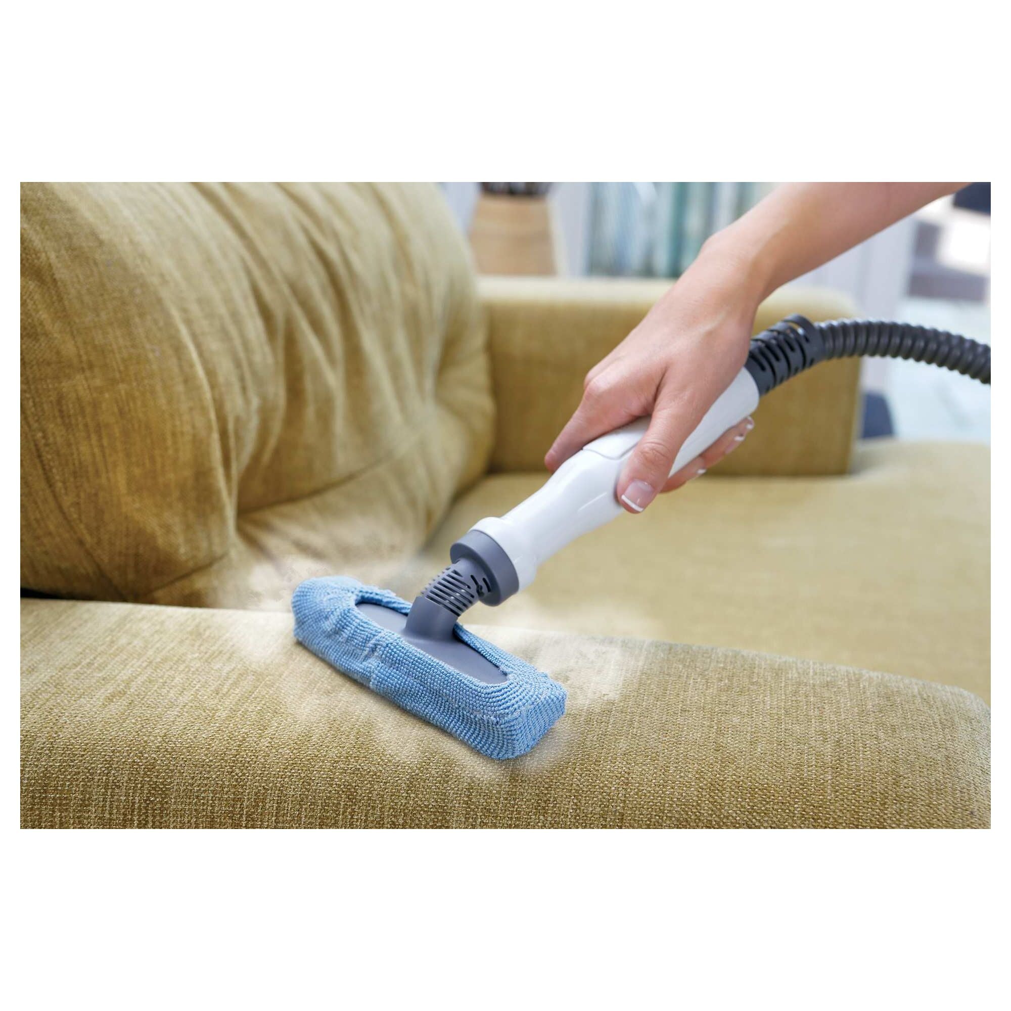 BLACK+DECKER SteamMop™ and Portable Steamer cleaning the sofa.