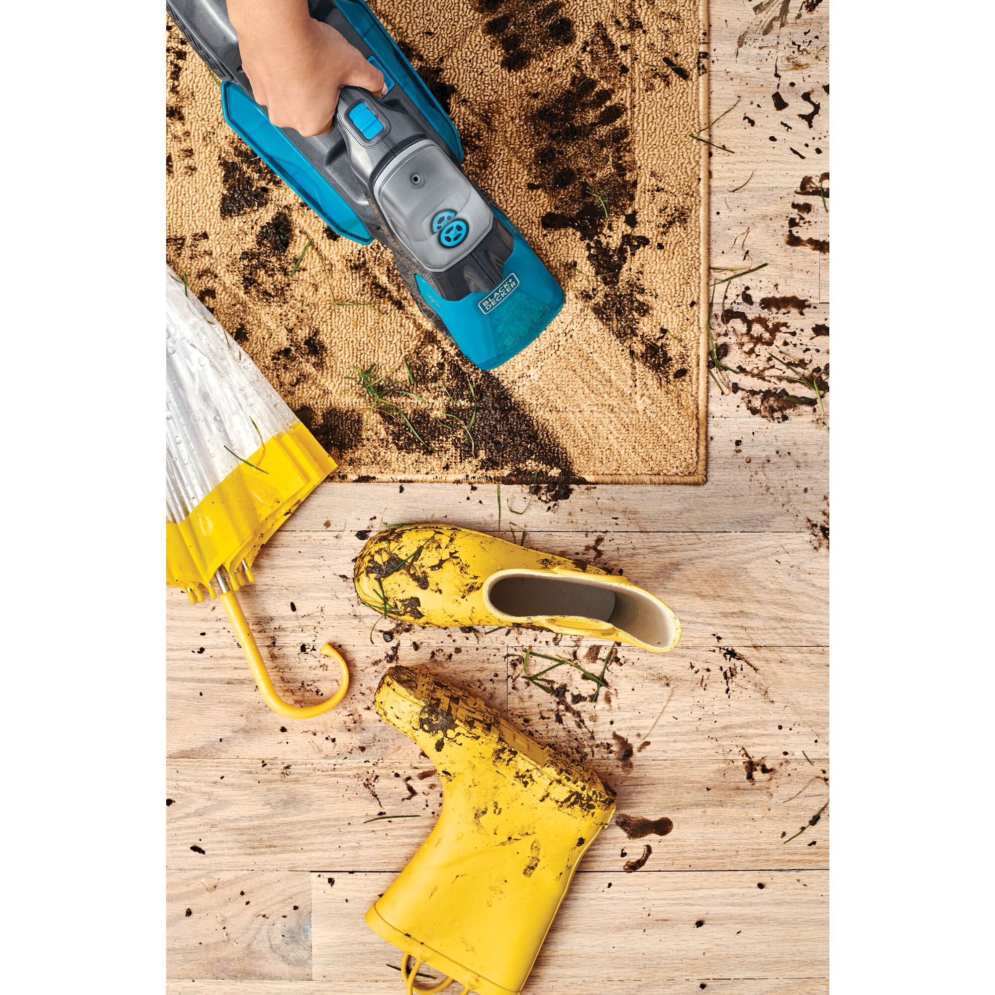 spill buster Cordless Spill plus Spot Cleaner being used to clean muddy indoor rug.