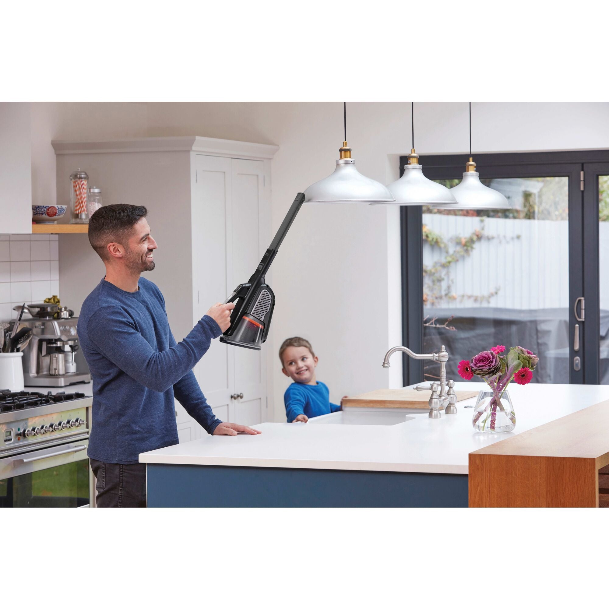 20 volt max dustbuster advancedclean cordless hand vacuum being used by a person.