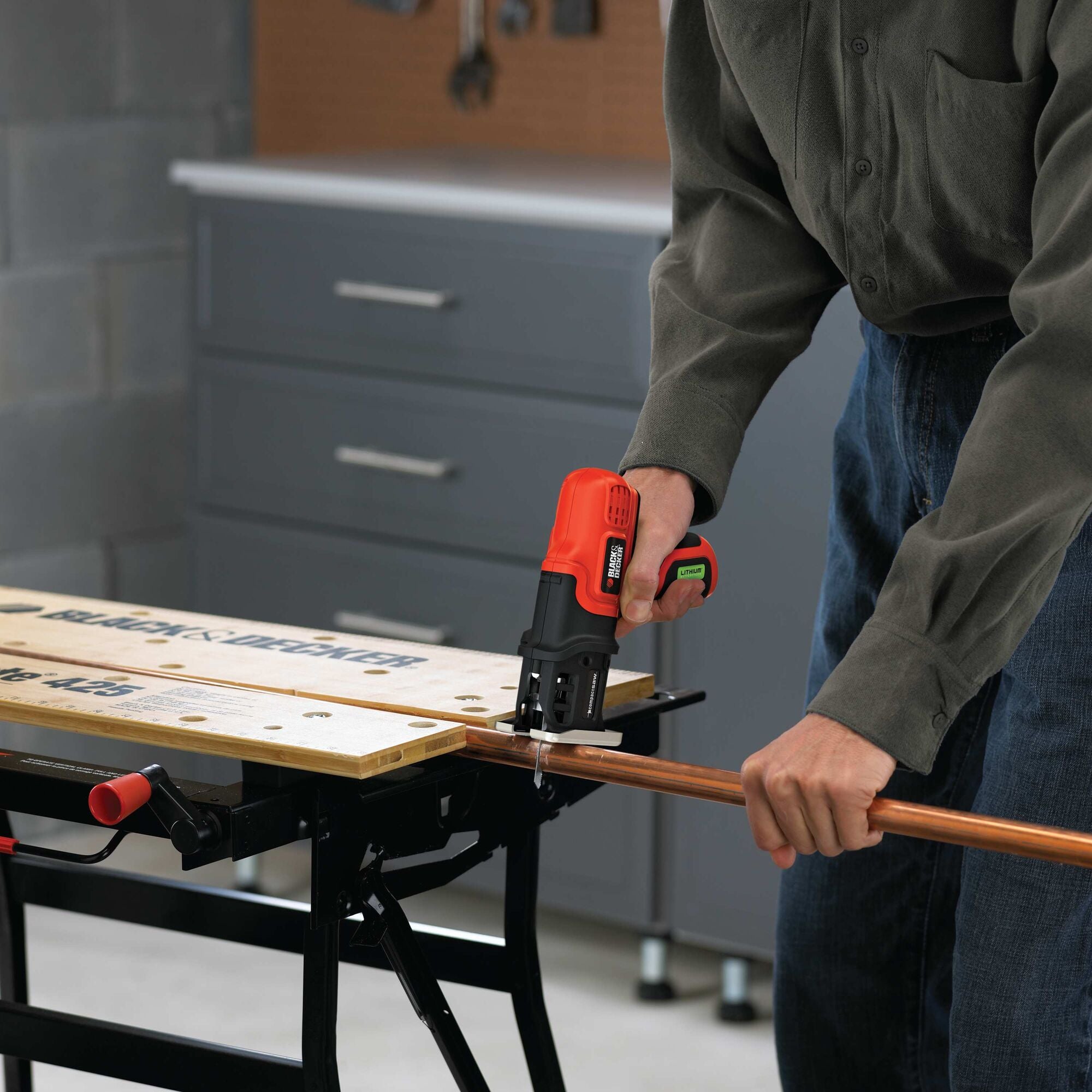 Jig Saw, Cordless, Compact is being used to cut wood
