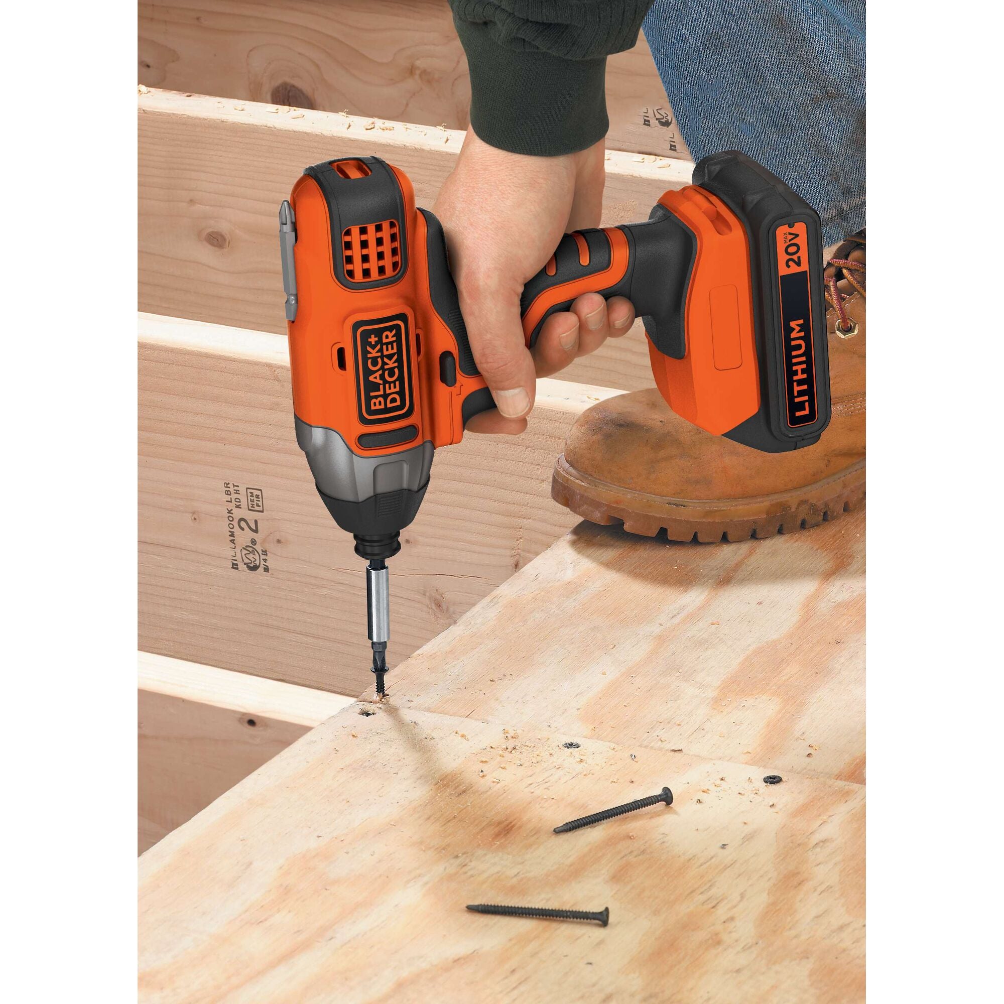 20 volt MAX Lithium Impact Driver Battery with Charger Not Included being used to drill nails.