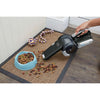 Dust buster Pivot Vac Cordless Hand Vacuum being used to clean spilt pet food from carpet.