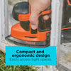 A person uses the BLACK+DECKER 20V MAX* Cordless Reciprocating Saw Kit. Compact and ergonomic design easily access tight spaces.
