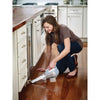 Dustbuster Cordless Hand Vacuum being used for cleaning food from floor.