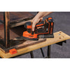 A person is using a BLACK+DECKER Cordless MOUSE™ 20V MAX* Sander on the iron stand.