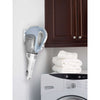 Dustbuster Cordless Hand Vacuum placed inside a laundry room.