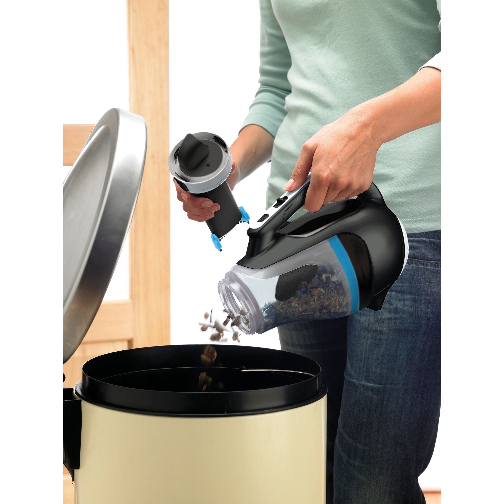 BLACK+DECKER dustbuster® Swivel Cordless Hand Vacuum vacuuming crumbs off floor