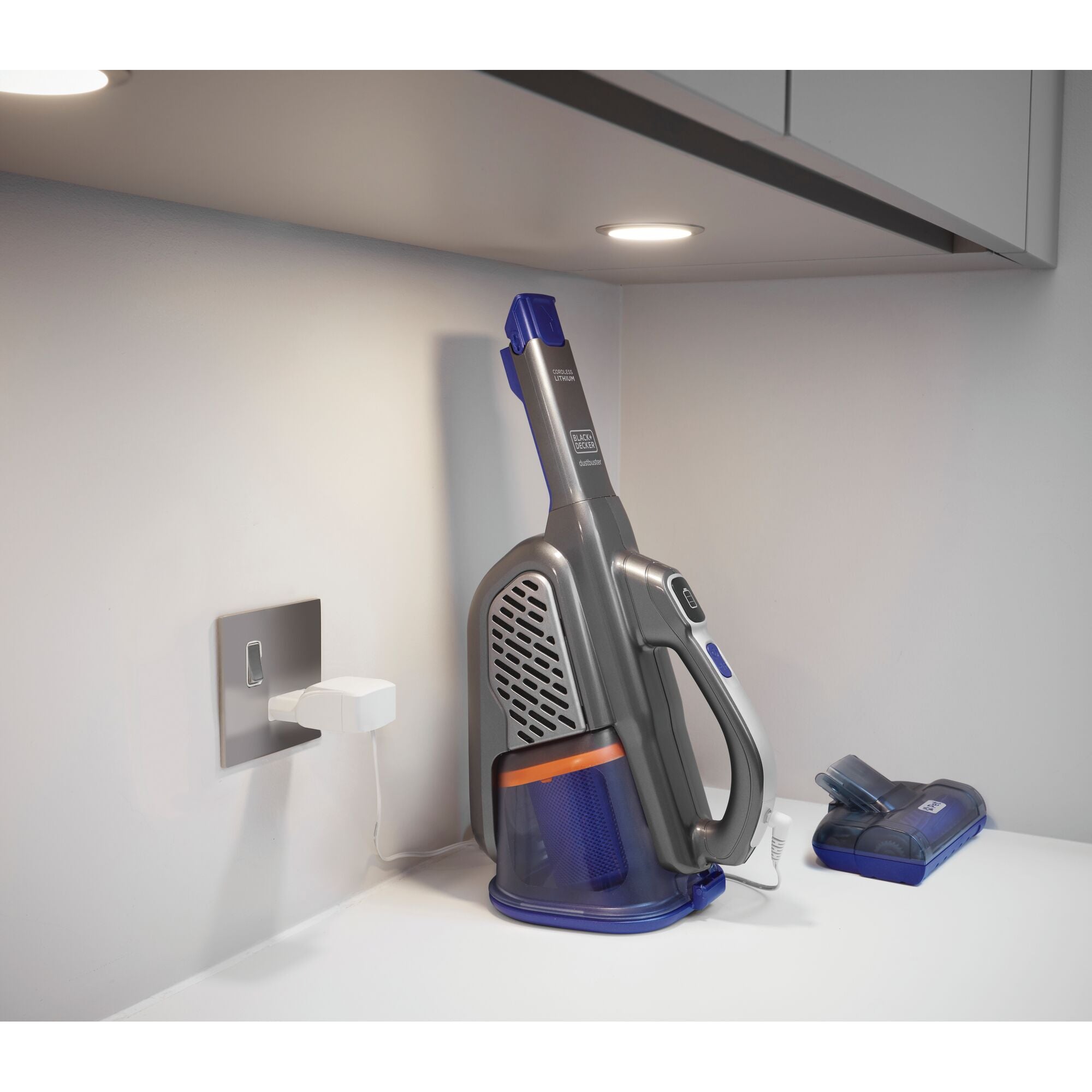 BLACK+DECKER dustbuster® AdvancedClean™ 20V MAX* Pet Hand Vacuum is connected to the charger.