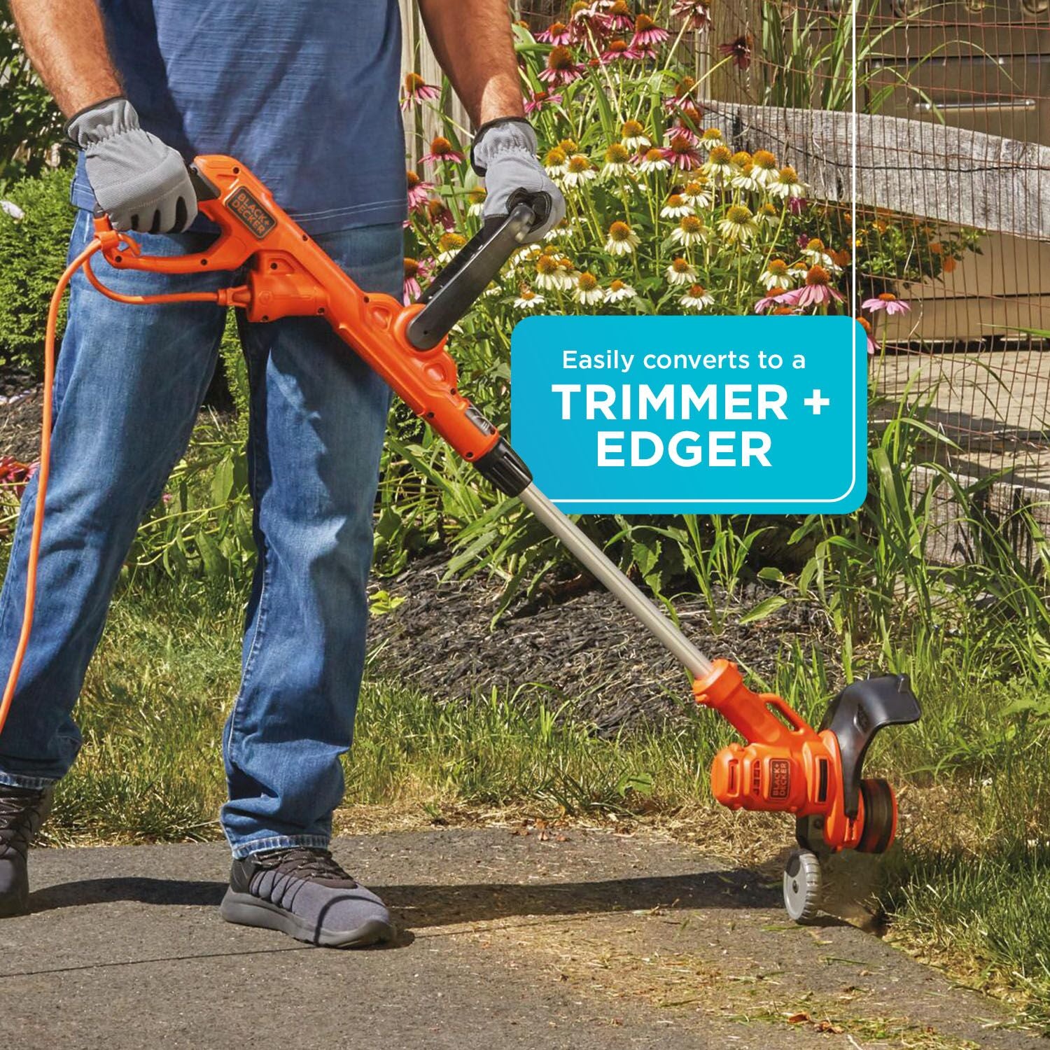 A person trims with the BLACK+DECKER 3-In-1 Corded Electric Lawn Mower, String Trimmer, Edger. Easily converts to a trimmer and edger.
