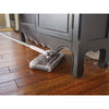 Head swiveling feature of 50 minute powered floor sweeper.