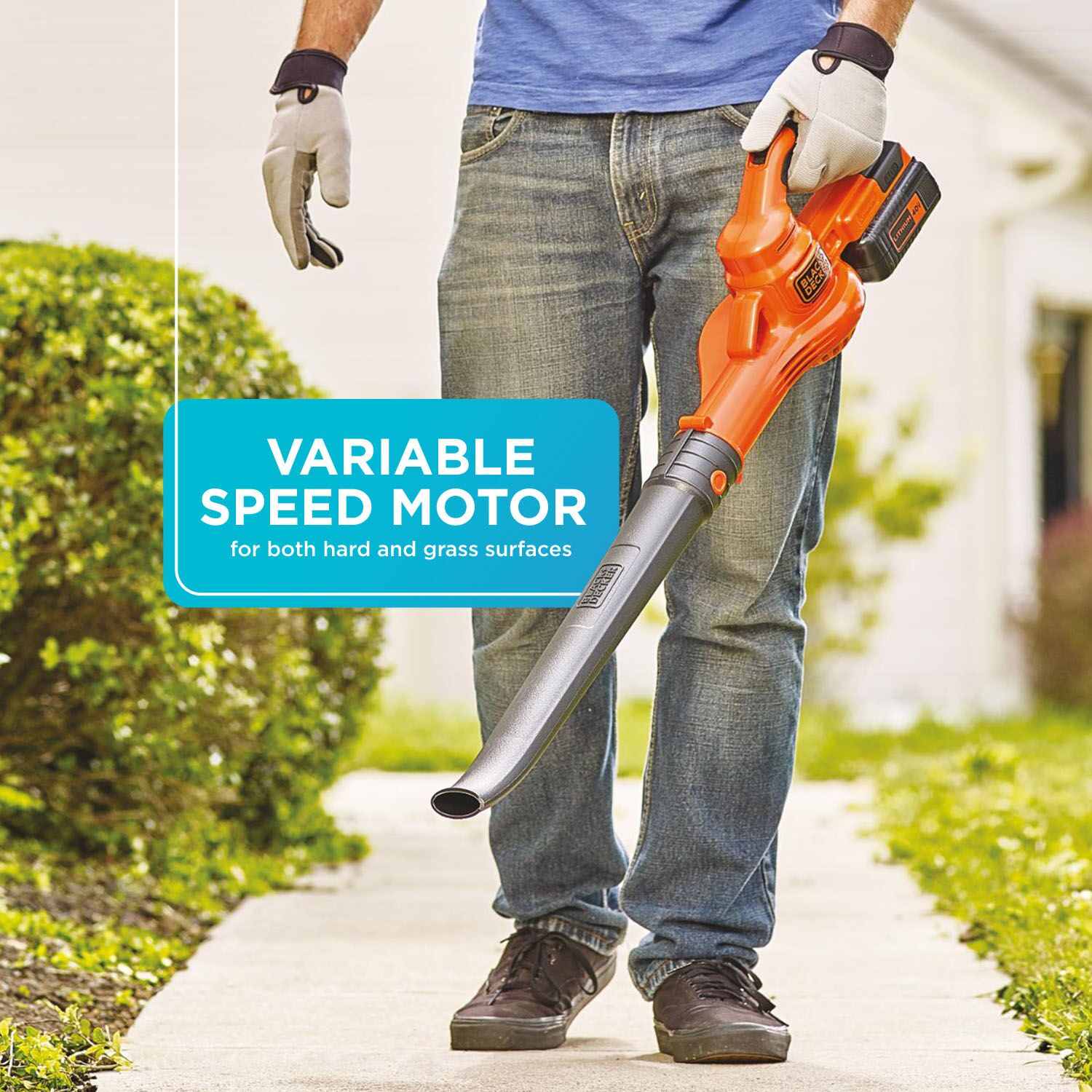 A person cleans the sidewalk with the BLACK+DECKER 40V MAX* Lithium String Trimmer / Edger and Sweeper Combo. Veriable speed motor for both hard and grass surfaces.