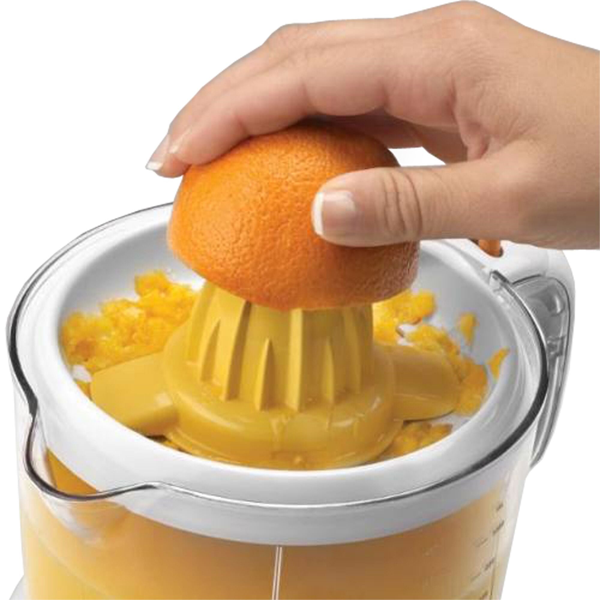 Citrus Juicer being used to make orange juice.