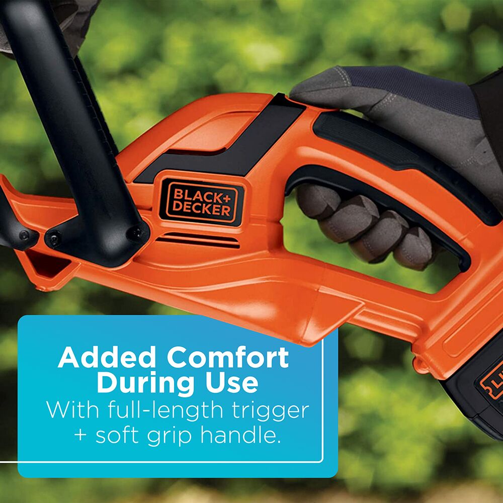 A person trims with the BLACK+DECKER 40V MAX* 24-in. Cordless Hedge Trimmer. Added comfort during use with full-length trigger and soft grip handle.