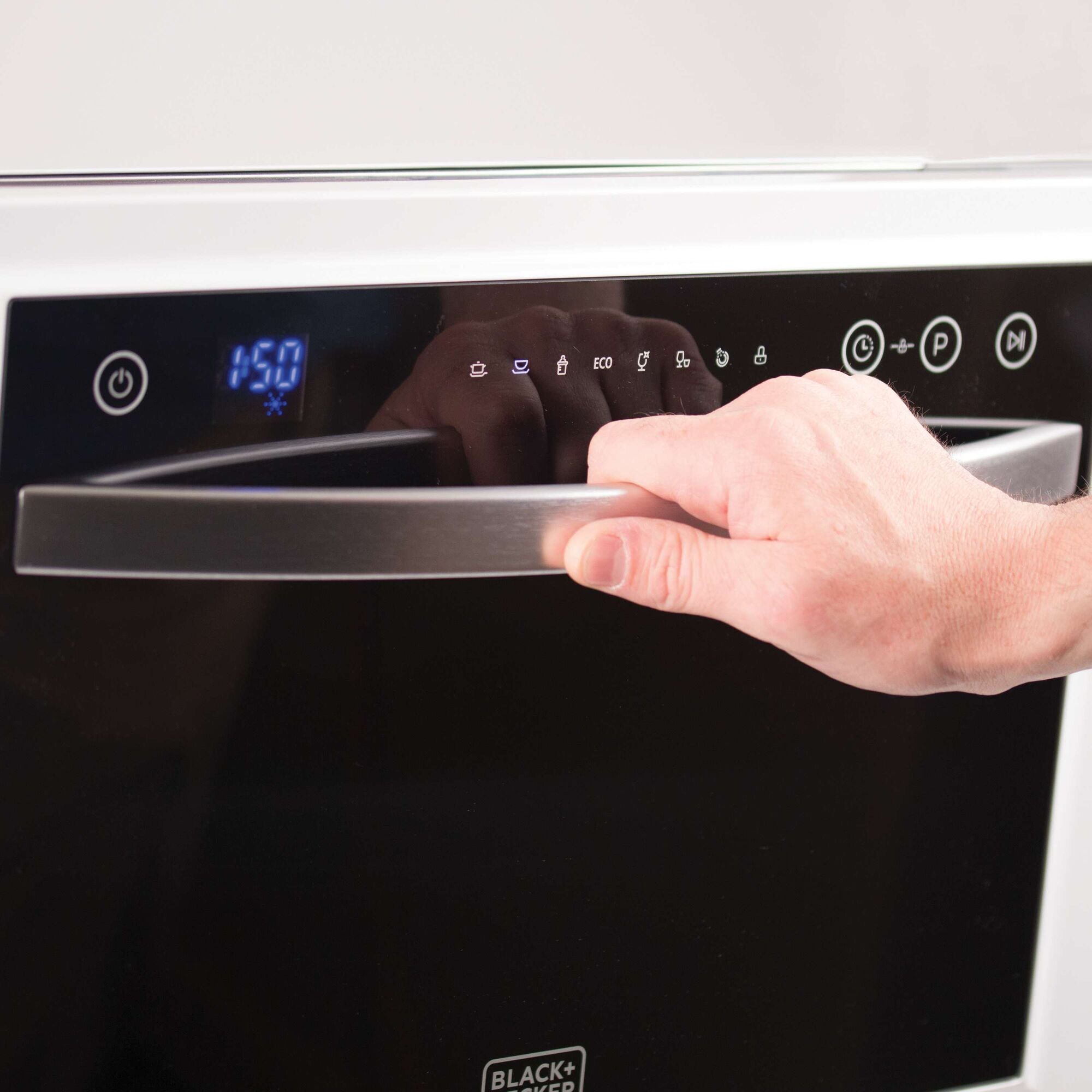 6 Place Setting Compact Countertop Dishwasher being used.