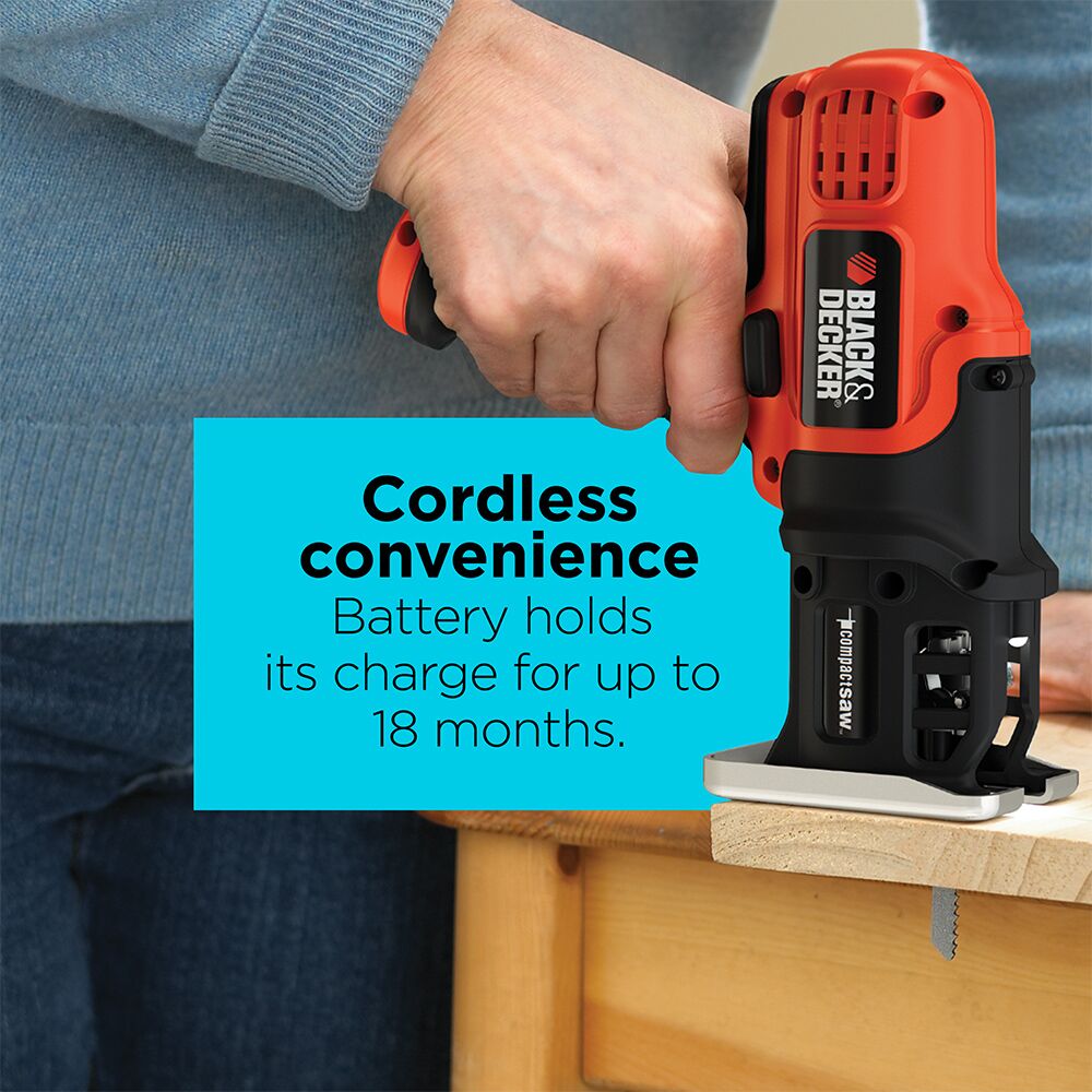 A person cuts  wood with the BLACK+DECKER Cordless Compact Jig Saw. Cordless convenience. Battery holds its charge for up to 18 months.