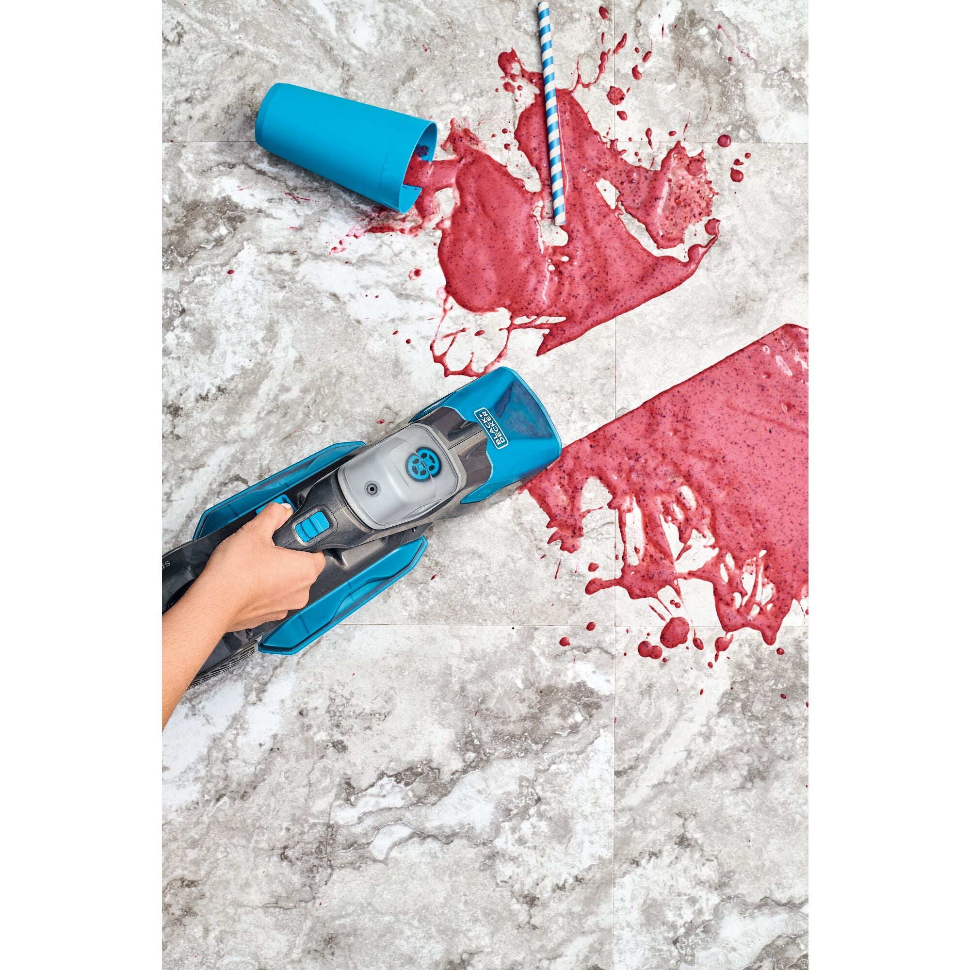 Spillbuster cordless spill plus spot cleaner being used to clean floor.