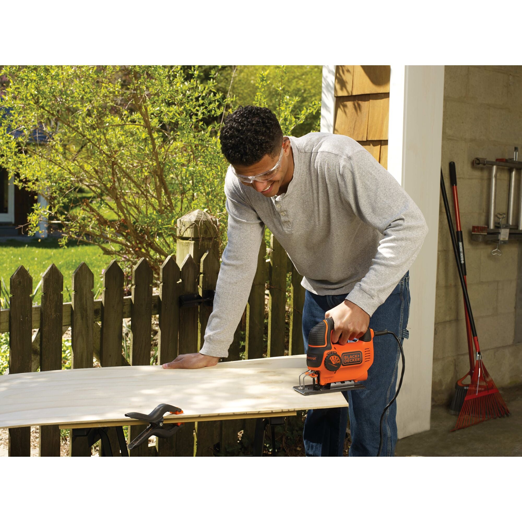 Corded Jig Saw, 5-Amp, Adjustable Cuts being used by a man
