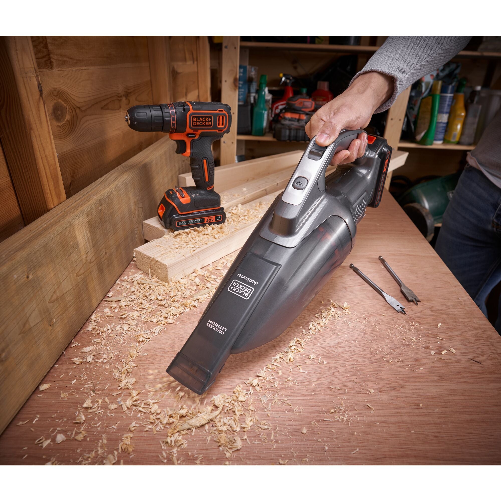 BLACK+DECKER dustbuster® POWERCONNECT™ 20V MAX* Cordless Handheld Vacuum is cleaning the inside of the car floor.